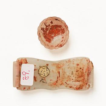 Two jade ornaments, presumably Neolitic.