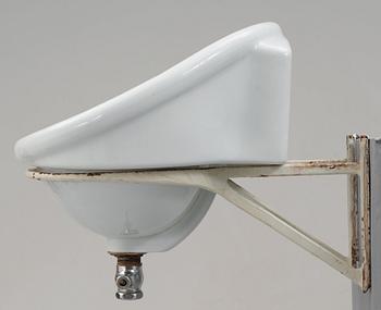 An Alvar Aalto molded porcelain wash basin for the Paimio Sanatorium, Arabia, Finland 1930's.