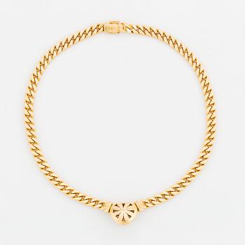 An 18K gold necklace set with round brilliant-cut diamonds.