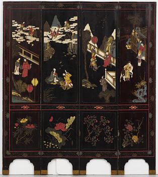 A Chinese four panel lacquer folding screen, first part of the 20th century.