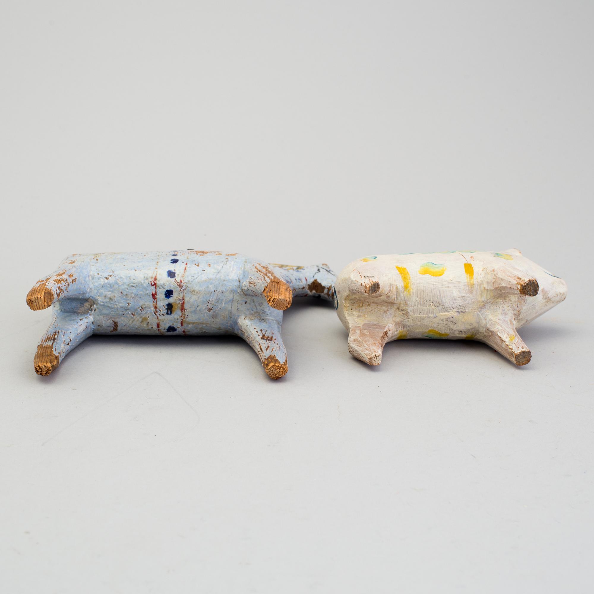 A painted folk art dala horse and dala pig, first half of the 20th century.