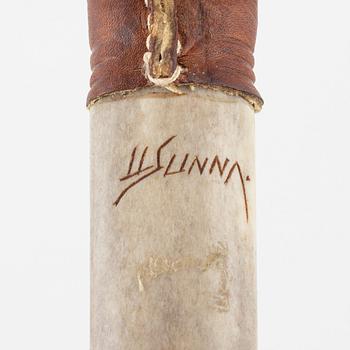 Lars Levi Sunna, a reindeer horn knife, signed.