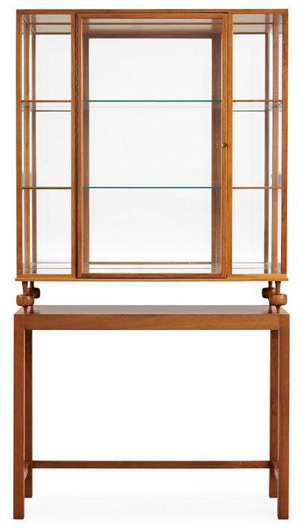 A Josef Frank walnut show case cabinet on stand,