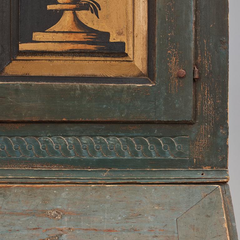 A polychrome-painted writing-cabinet attributed to J. Bäckström (1773-1837), dated 1828.