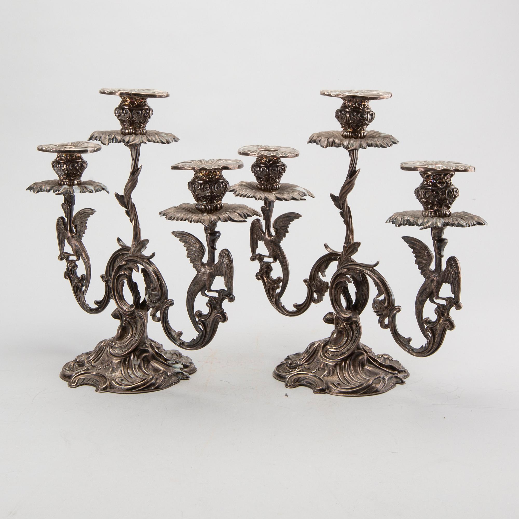 A pair of Swedish silver candelabra mark of GUSTAF MÖLLENBORG Stockholm 1846 , total weight ca 4420 gr, height 31 cm.