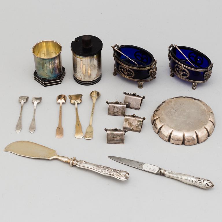 A collection of silver and silver plated objects, including Gustaf Folcker, Stockholm, 1849 and Garrard & Co, London, 19.