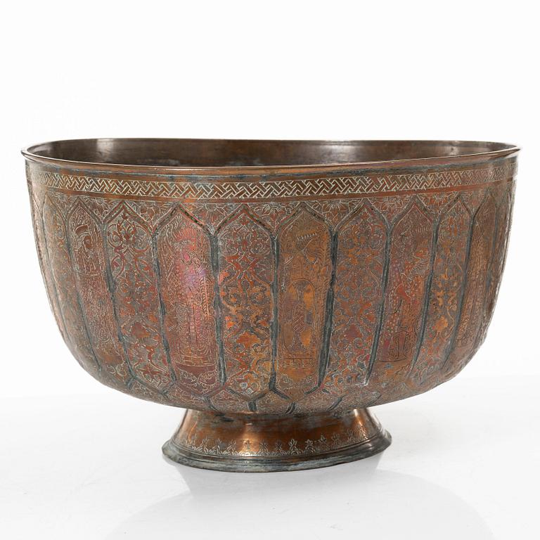 A large Persian copper bowl, late Qajar dynasty / early 1900s.