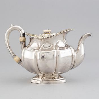 A Russian 19th century parcel-gilt silver tea-pot, mark of Adolf Sper, St. Petersburg 1837.