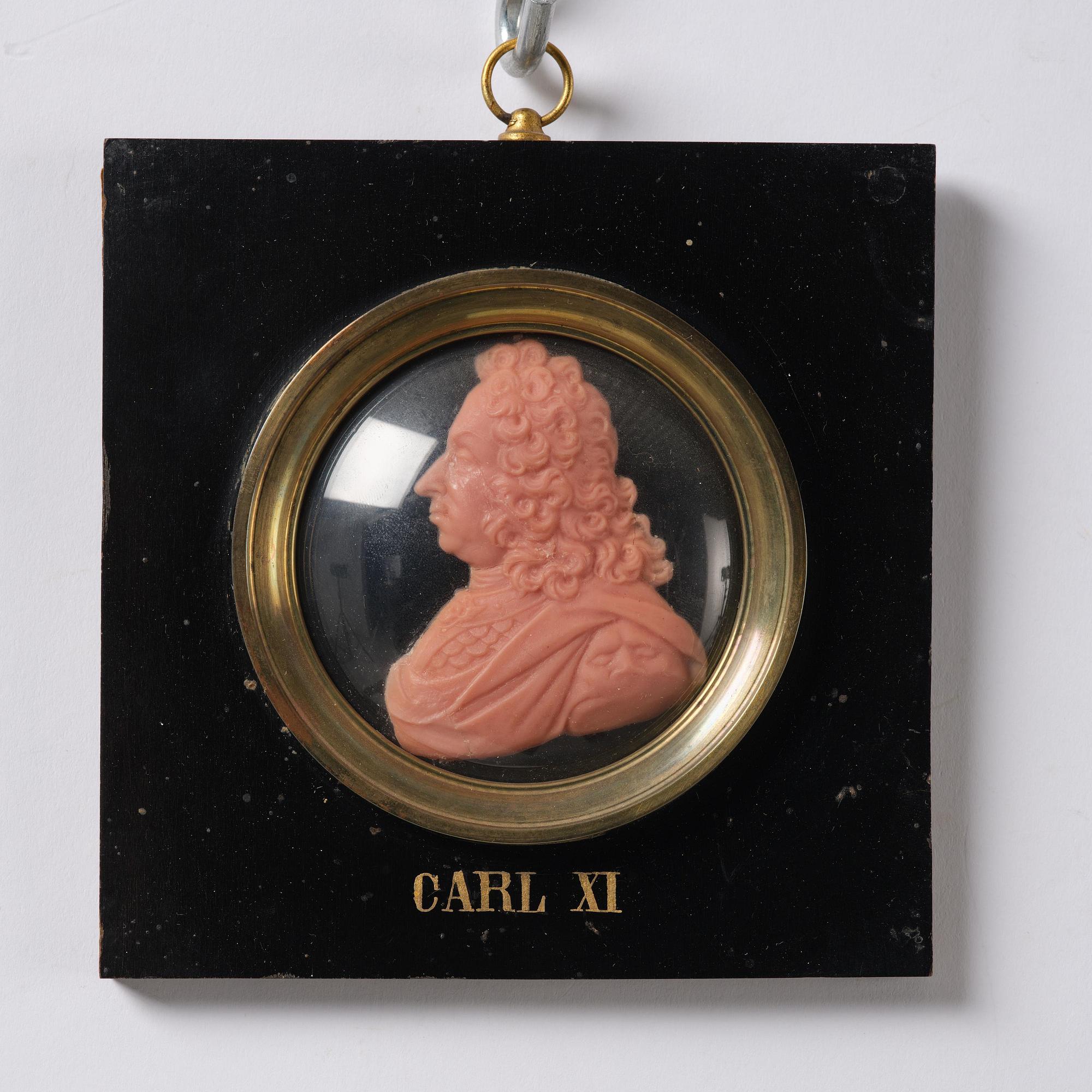 A set of twenty wax portraits of Swedish monarchs, late 19th century.