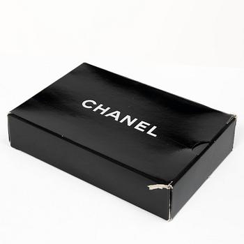 Chanel, A black leather vintage pouch, 1989-1991.