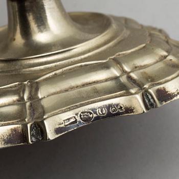 A pair of paktong candlesticks, second half of the 18th century.