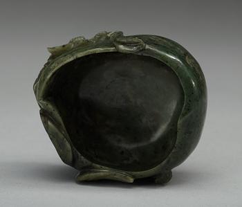 A carved nephrite brush washer, Qing dynasty.