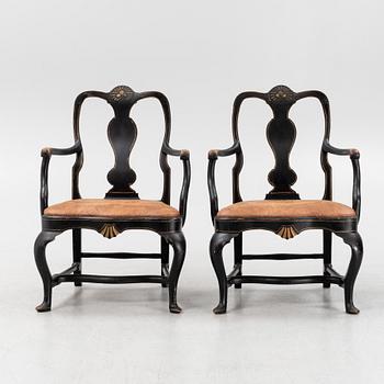 A pair of Rococo style armchairs. first half of the 20th Century.