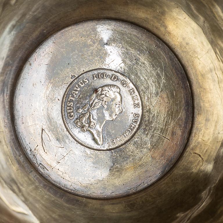 A silver beaker by Erik Ernander, Uppsala, 1809.