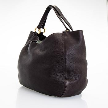Gucci, an "Interlocking G" bag.