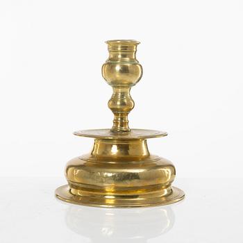 A Northern European baroque brass candlestick, late 17th century.
