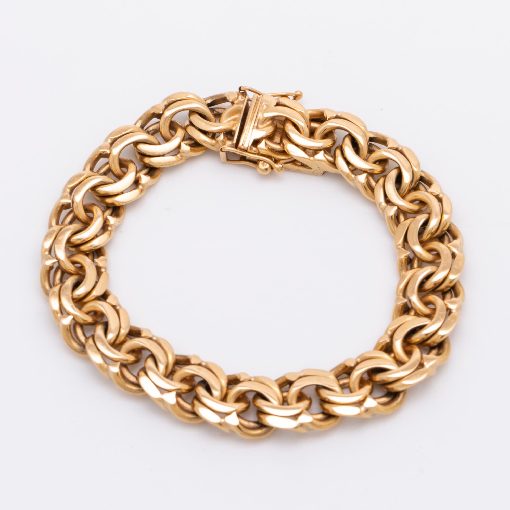 Bracelet 18K gold, 59,8 g, approx 19 x 1 cm.