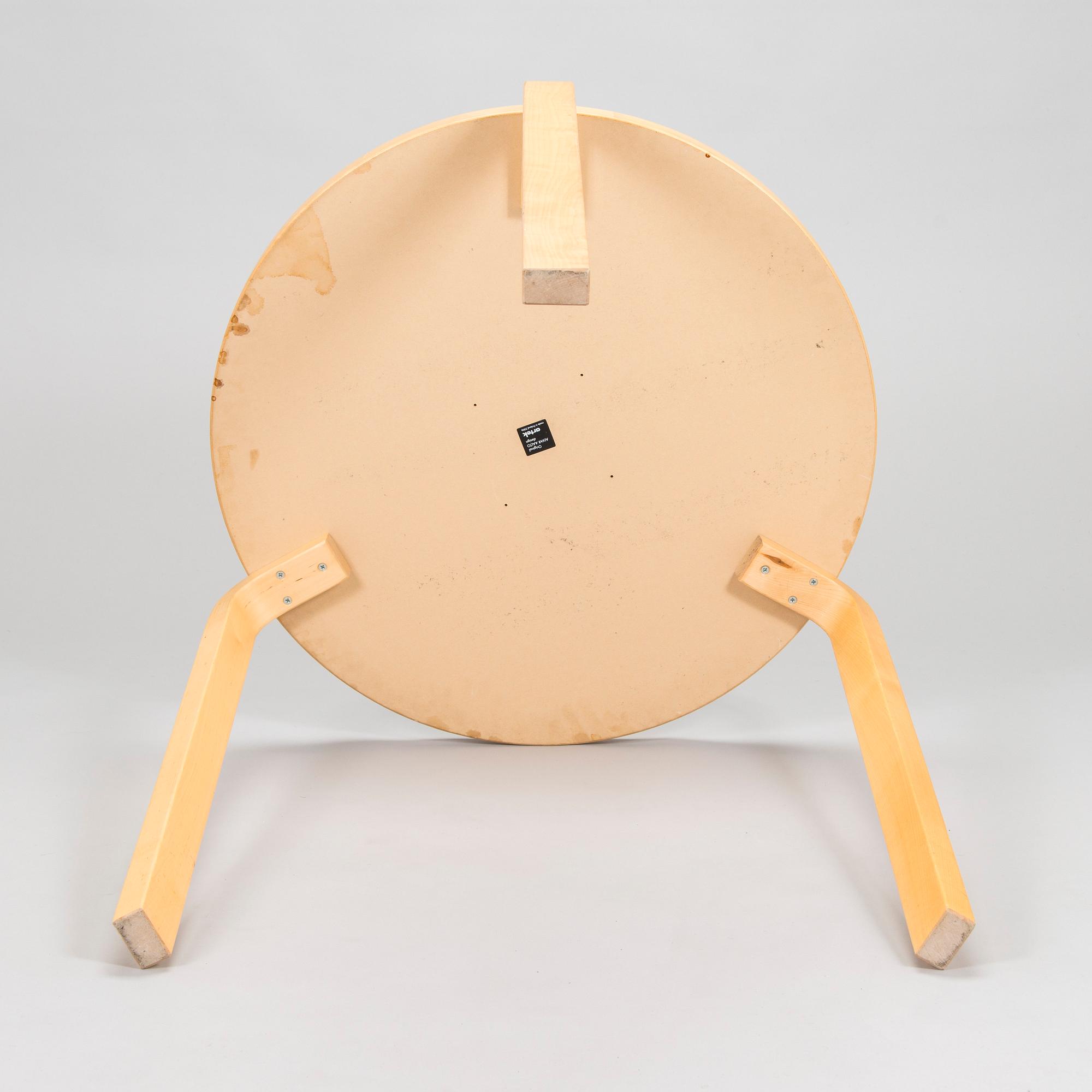 Alvar Aalto, a table and three chairs, Artek 2006 and 2007.