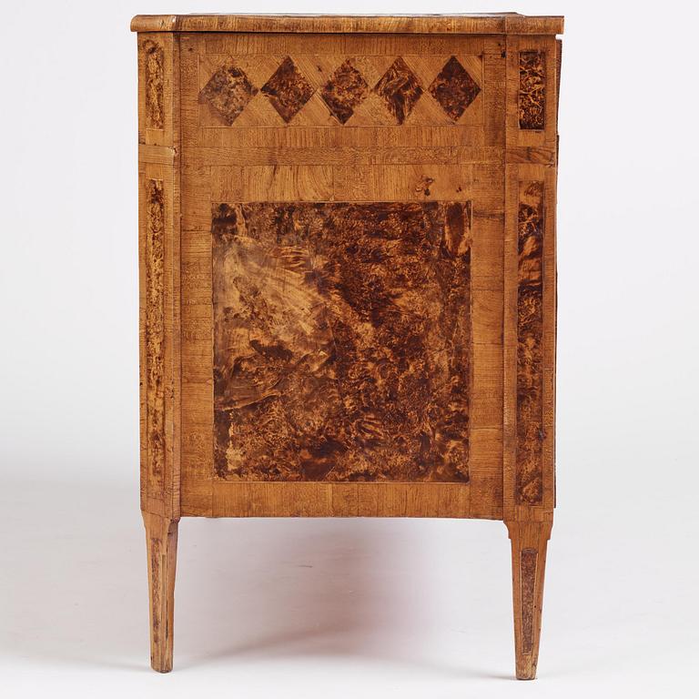 A late Gustavian burr alder-veneered commode, Mälardalen, late 18th century.