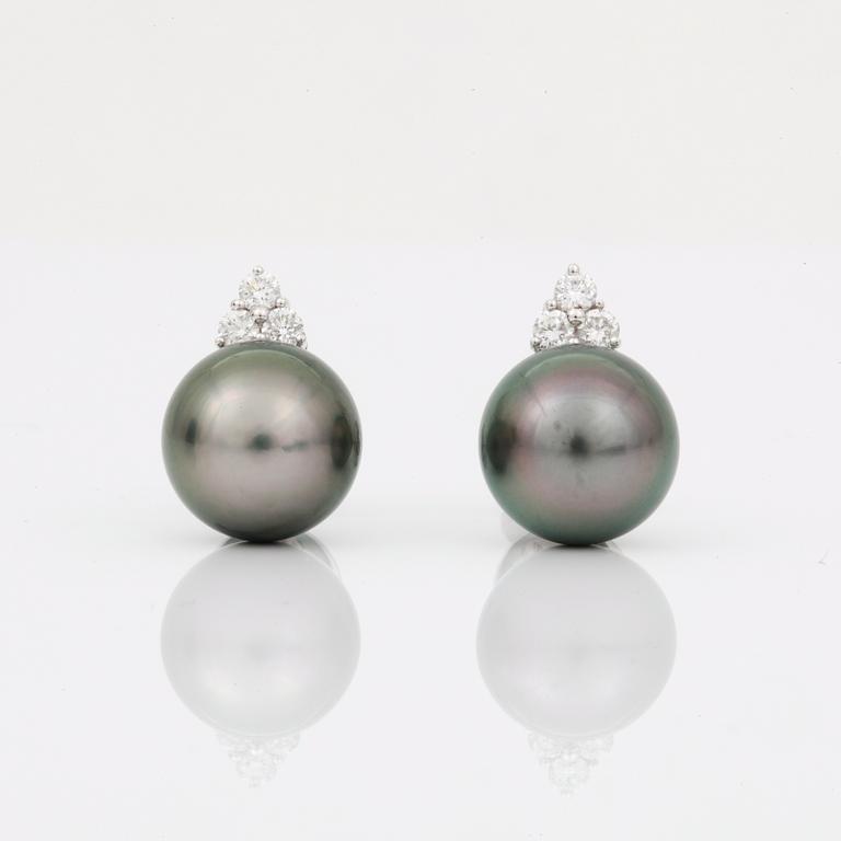 EARRINGS, studs with black cultivated pearls circa 11mm and diamonds circa 0.30cts.