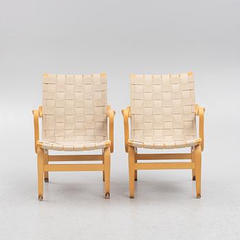 Bruno Mathsson, a pir of 'Eva' armchairs, Dux, late 20th century.