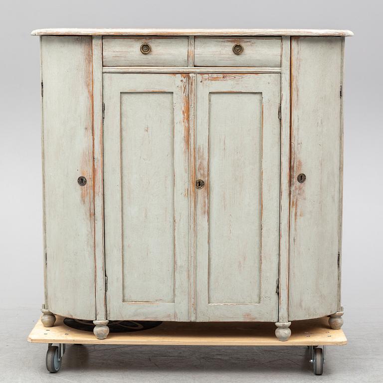 A mid 19th century painted cupboard.