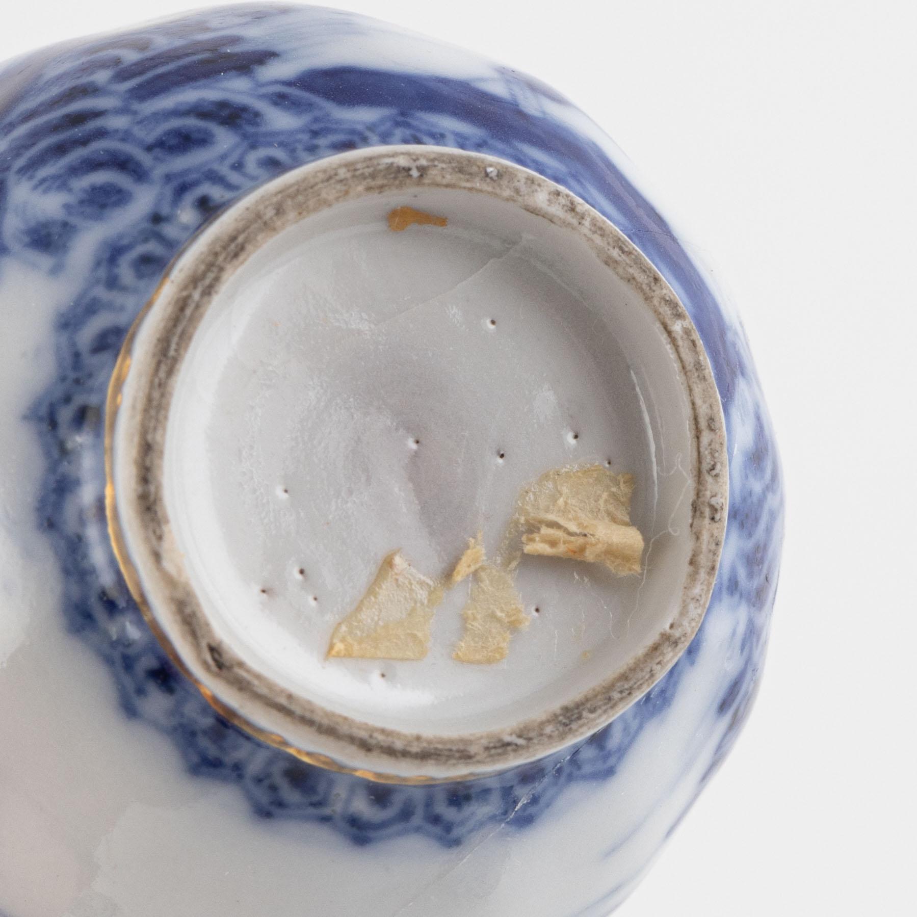 A small Chinese export tureen with cover, two cups, a saucer and a jug with cover, Qing dynasty, 18th century.