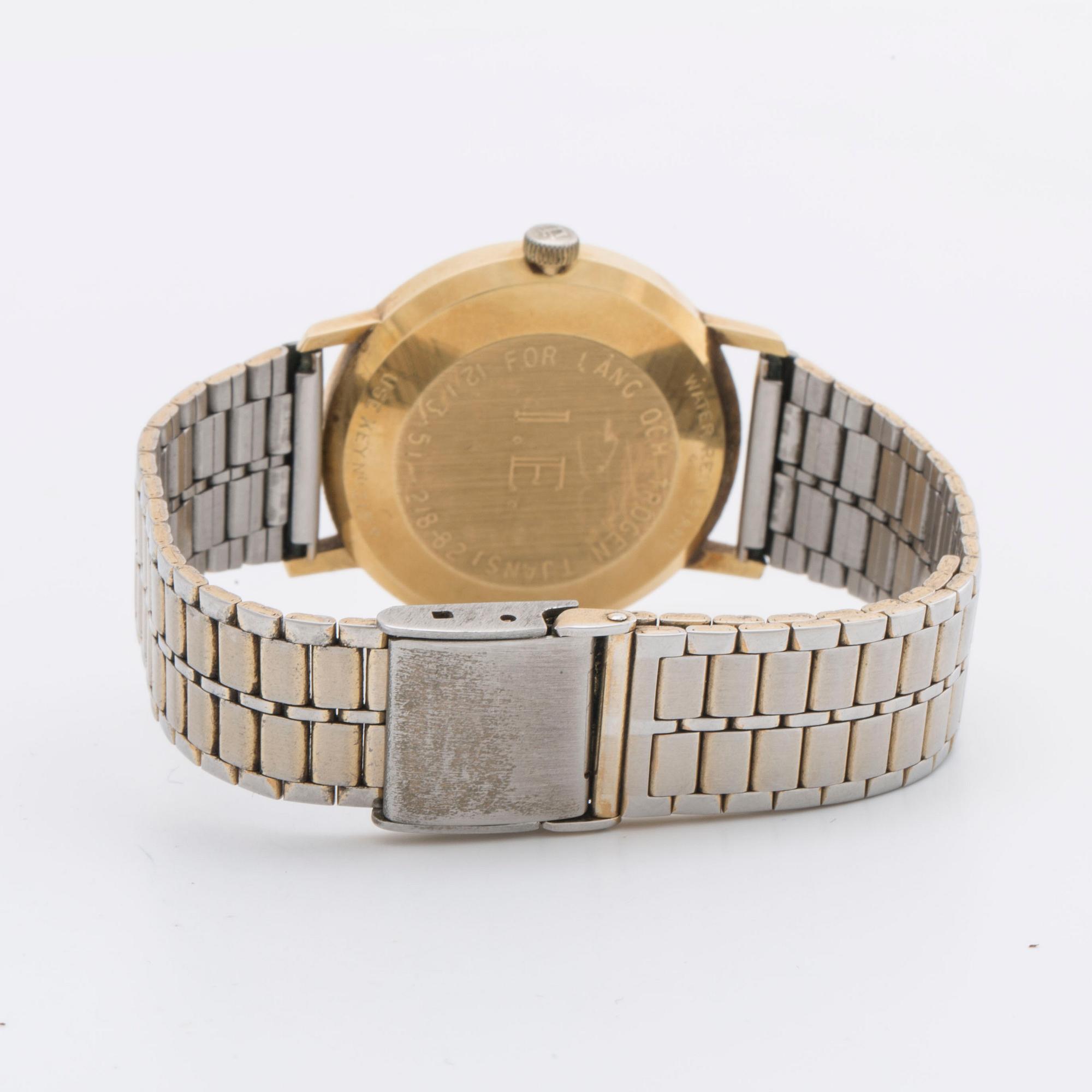 TISSOT, Seastar Seven, 18K, wristwatch 34 mm 1980's.