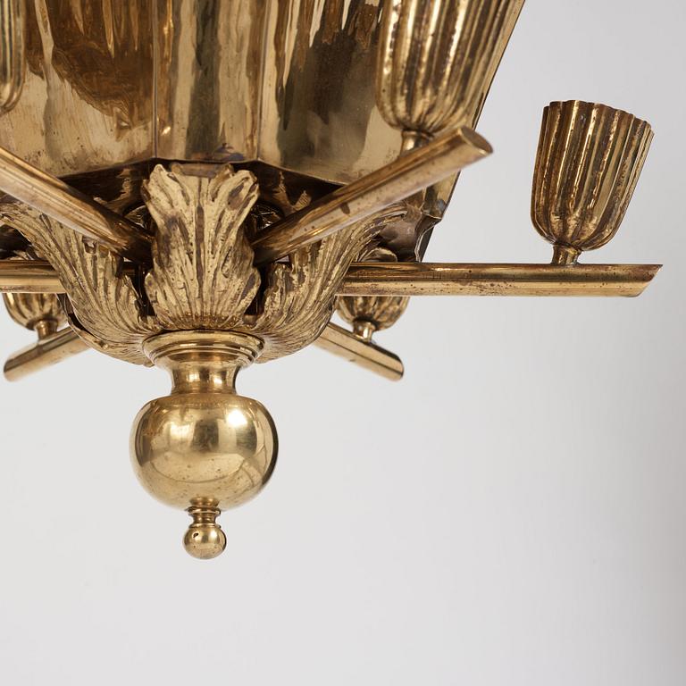 A.W. Borgh, a pair of Swedish Grace brass chandeliers, probably 1920-1930's.