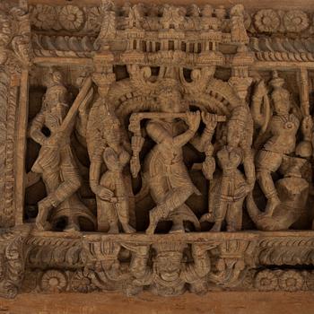 A carved wooden panel, India, circa 1900.