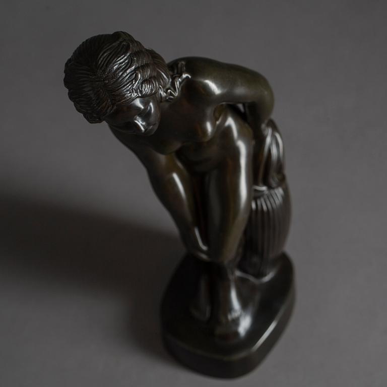 JUST ANDERSEN, a signed metal sculpture.