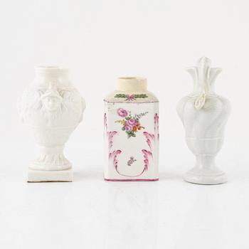 Two white glazed Nymphenburg vases and a Swedish Marieberg tea caddy, 18th Cenury.