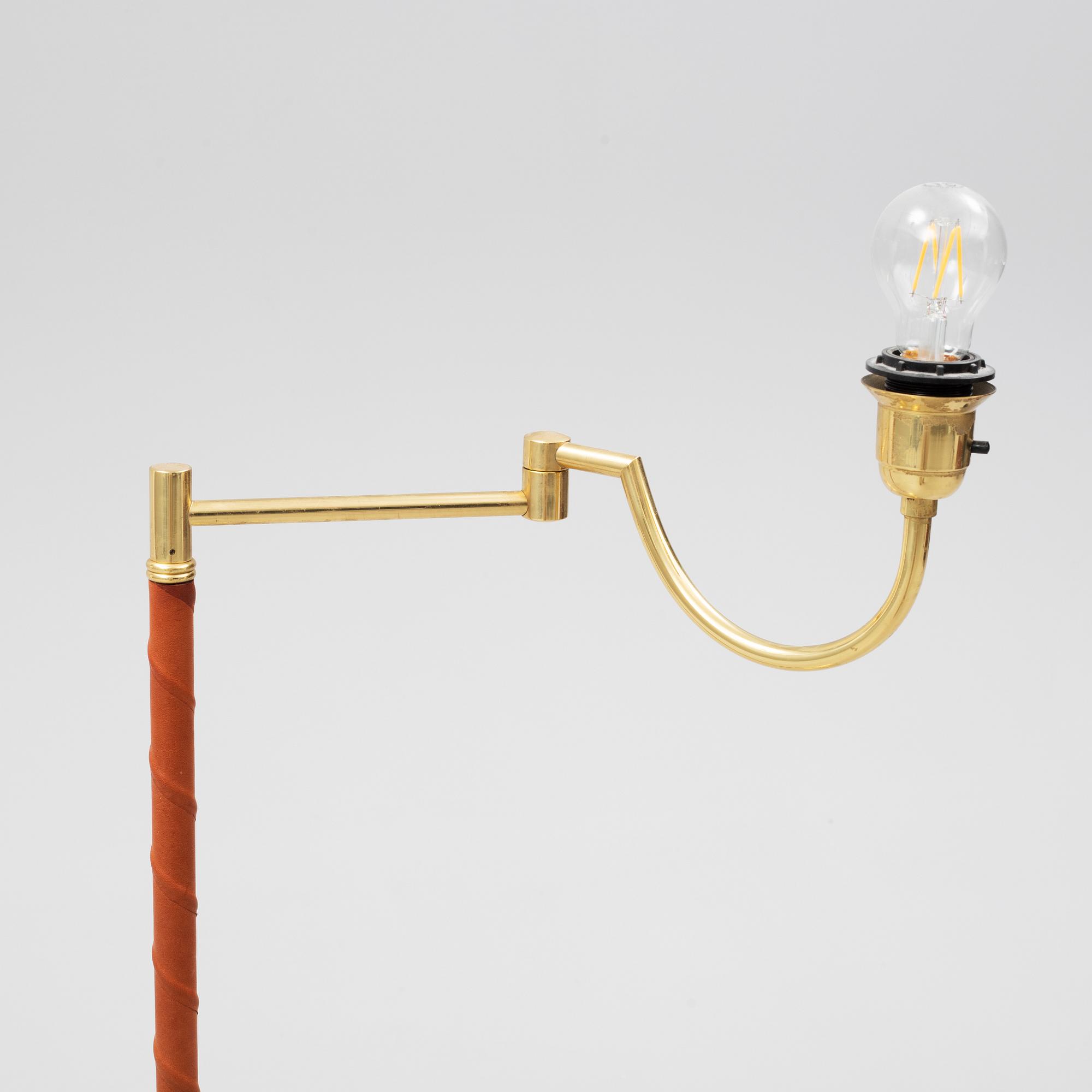 A brass floor lamp from EWÅ, second part of the 20th Century.