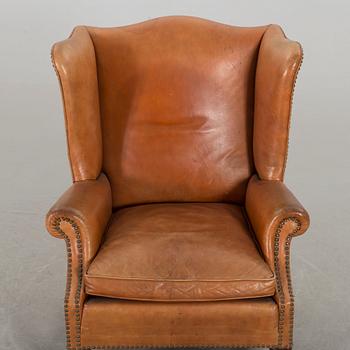 A LEATHER ARMCHAIR, second half of 20th century.