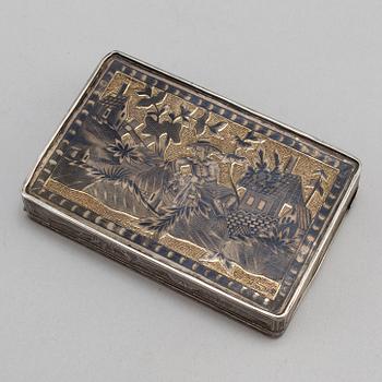A Russian mid 19th century silver-gilt and niello snuff-box, mark of Moscow.