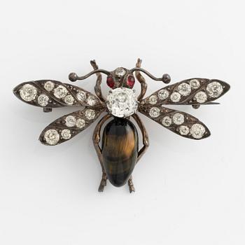 Brooch with white paste stones and tiger's eye.