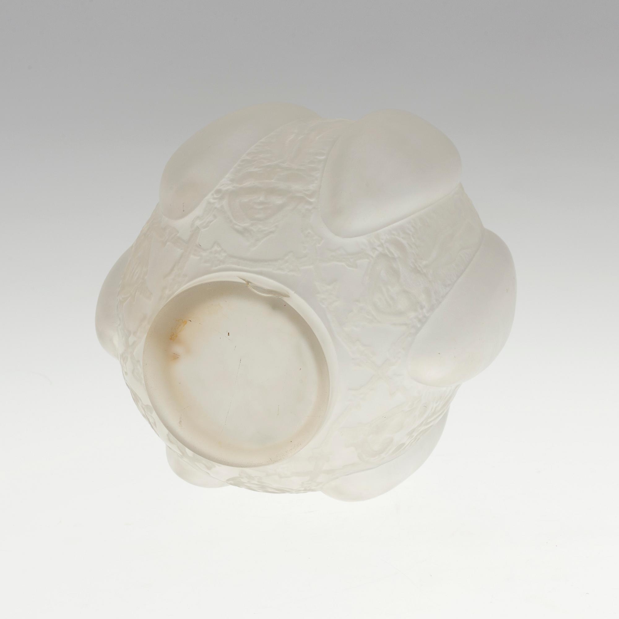 A René Lalique 'Six figurines et masques' moulded glass vase, France 1920-30's.