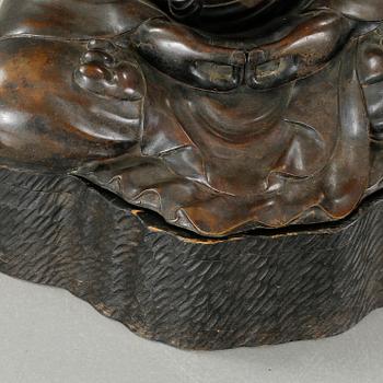 A Japanese Buddha sculpture, 20th Century.