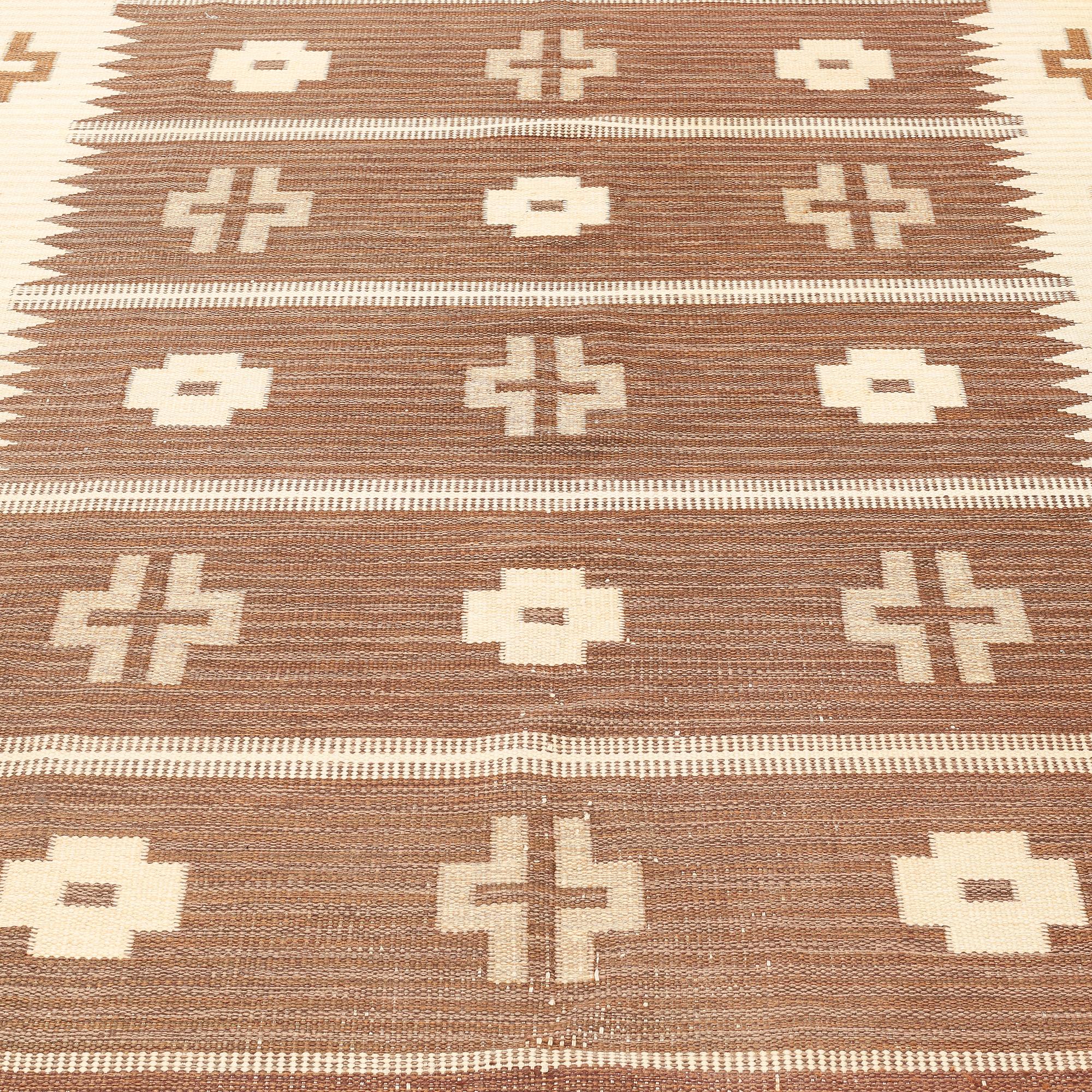 A carpet, flat weave, ca 291 x 202 cm, signed SH.