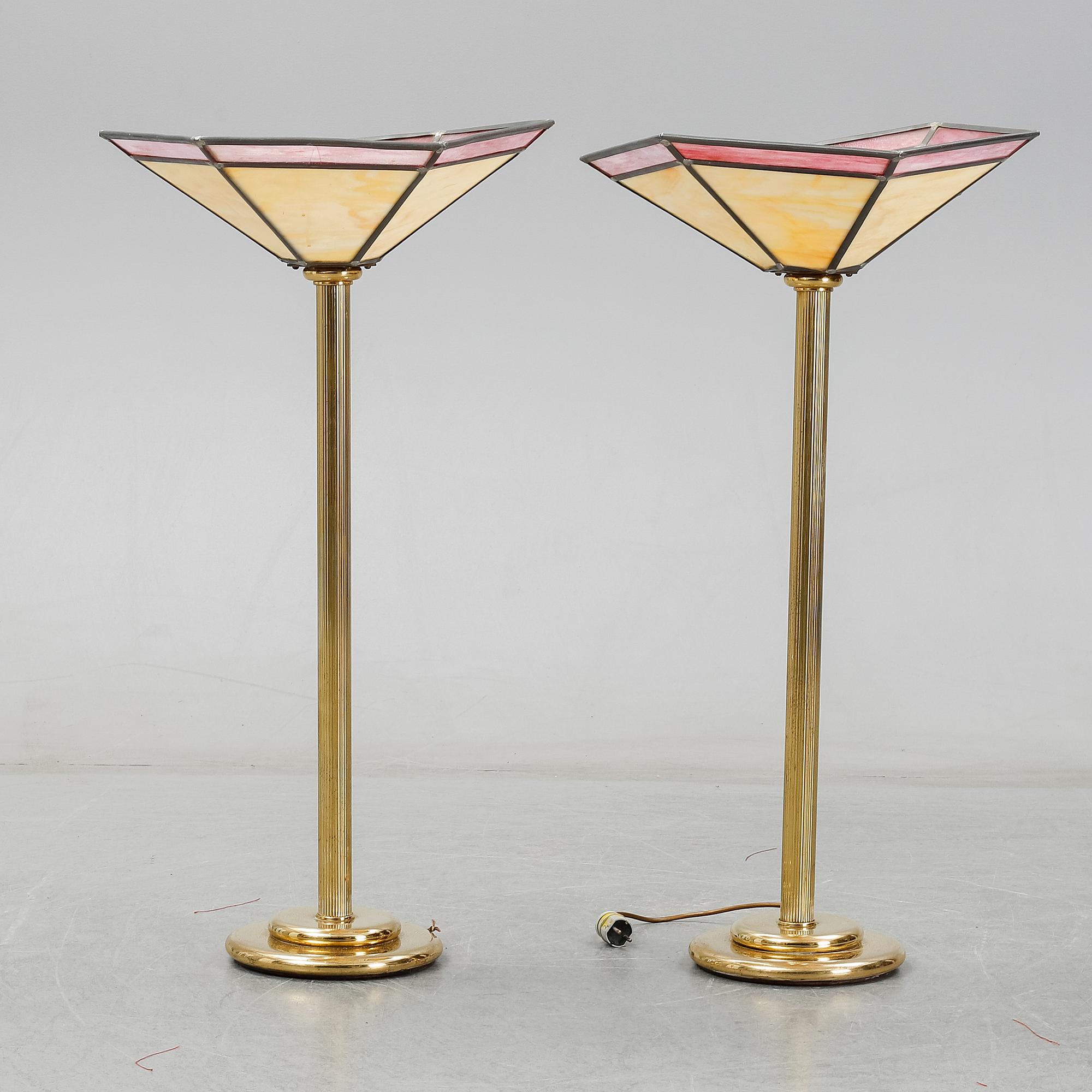 A pair of lamps, second hanf of the 20th Century.