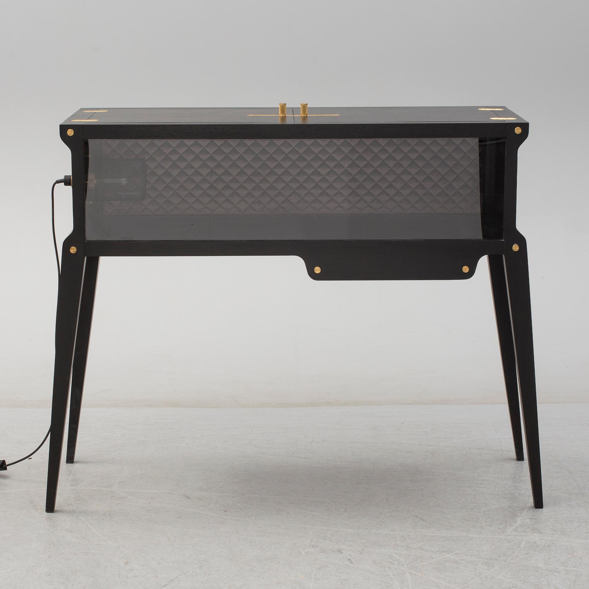 A 21st century 'The Rockstar Bar' cocktail cabinet, Buster & Punch, London.