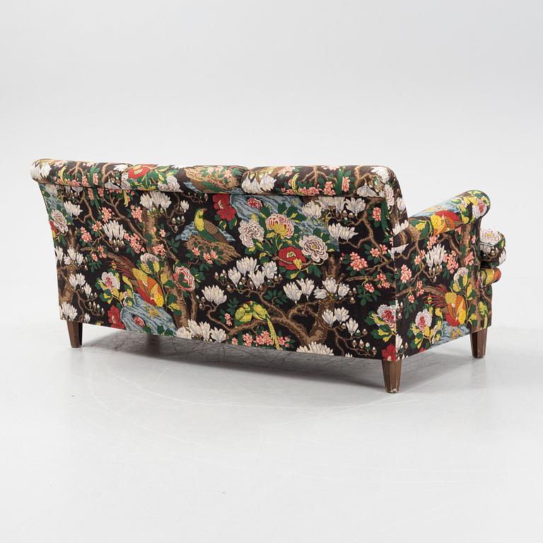 A model 703 sofa by Josef Frank for Firma Svenskt Tenn.