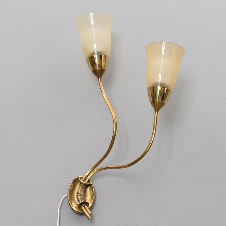 A 1940s wall light for Taito Oy, Finland.