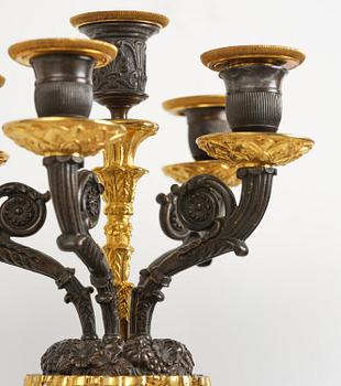 A pair of French Empire five-branch gilt and patinated bronze appliques, first part 19th century.