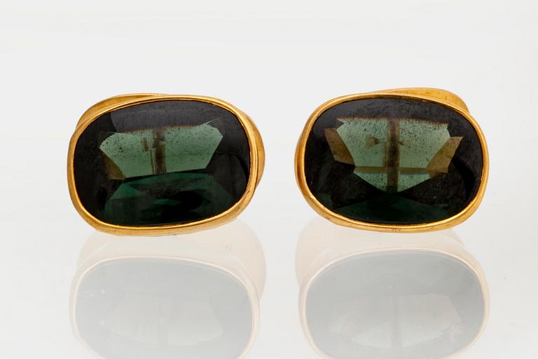 Manschettknappar 18K guld med grön quartz ca 15 x 10 mm, total vikt 10,3 g.