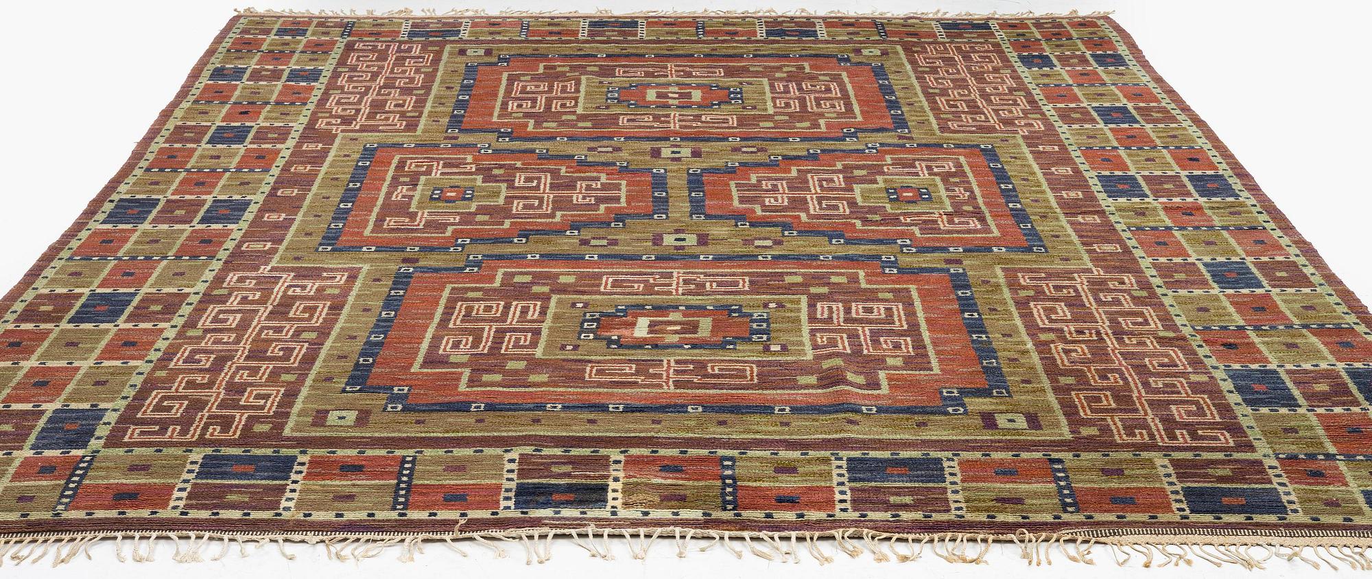 Märta Måås-Fjetterström, a carpet, 'Storkorset' ('Åhléns matta'), knotted pile, c. 380 x 323 cm, signed MMF.