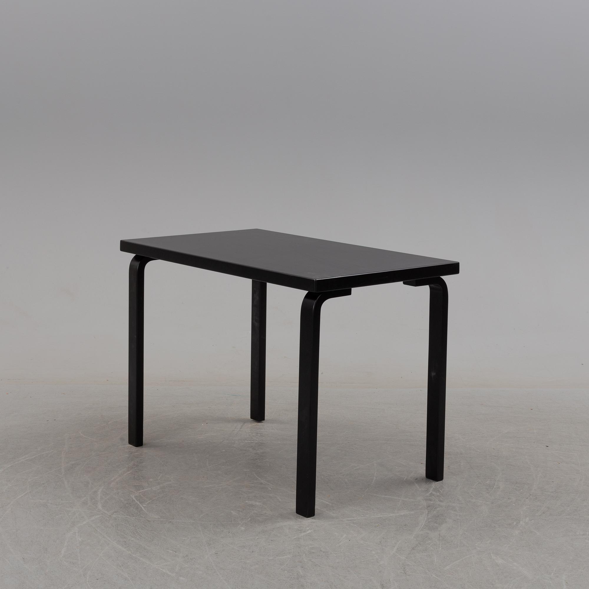 a dining table '81B' and four '69' chairs by Alvar Aalto, Artek.