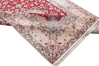 An Esfahan carpet with silk warp, c. 298 x 206 cm.