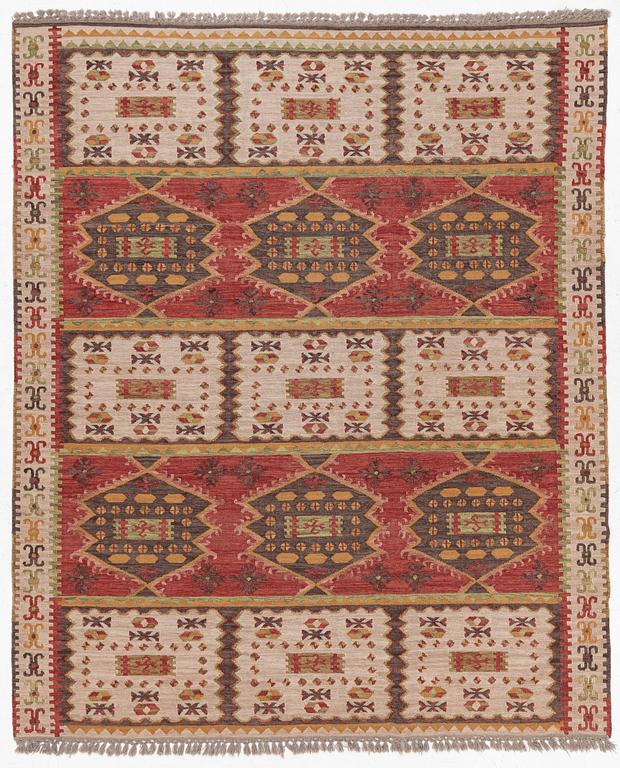 A Kilim carpet, c. 305 x 250 cm.