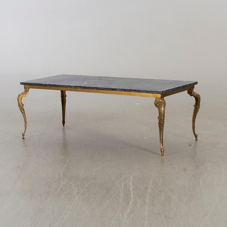 A MARBLE TOP COFFEE TABLE.